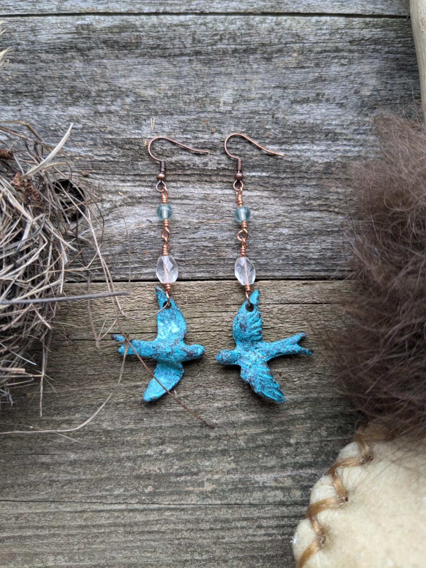 On the Wing, Blue Patina Bird Dangle Earrings with Clear Quartz and Blue Apatite
