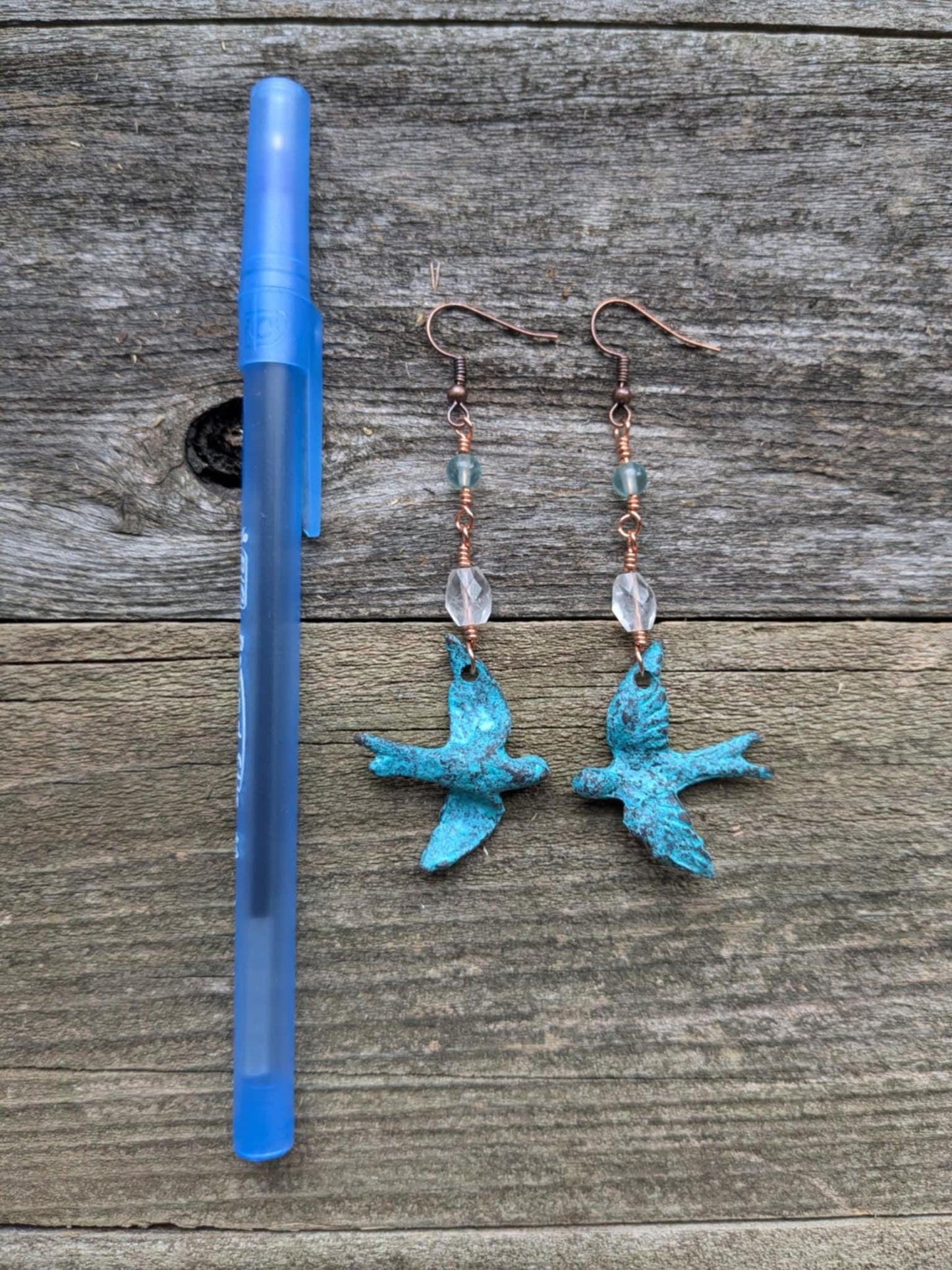 On the Wing, Blue Patina Bird Dangle Earrings with Clear Quartz and Blue Apatite